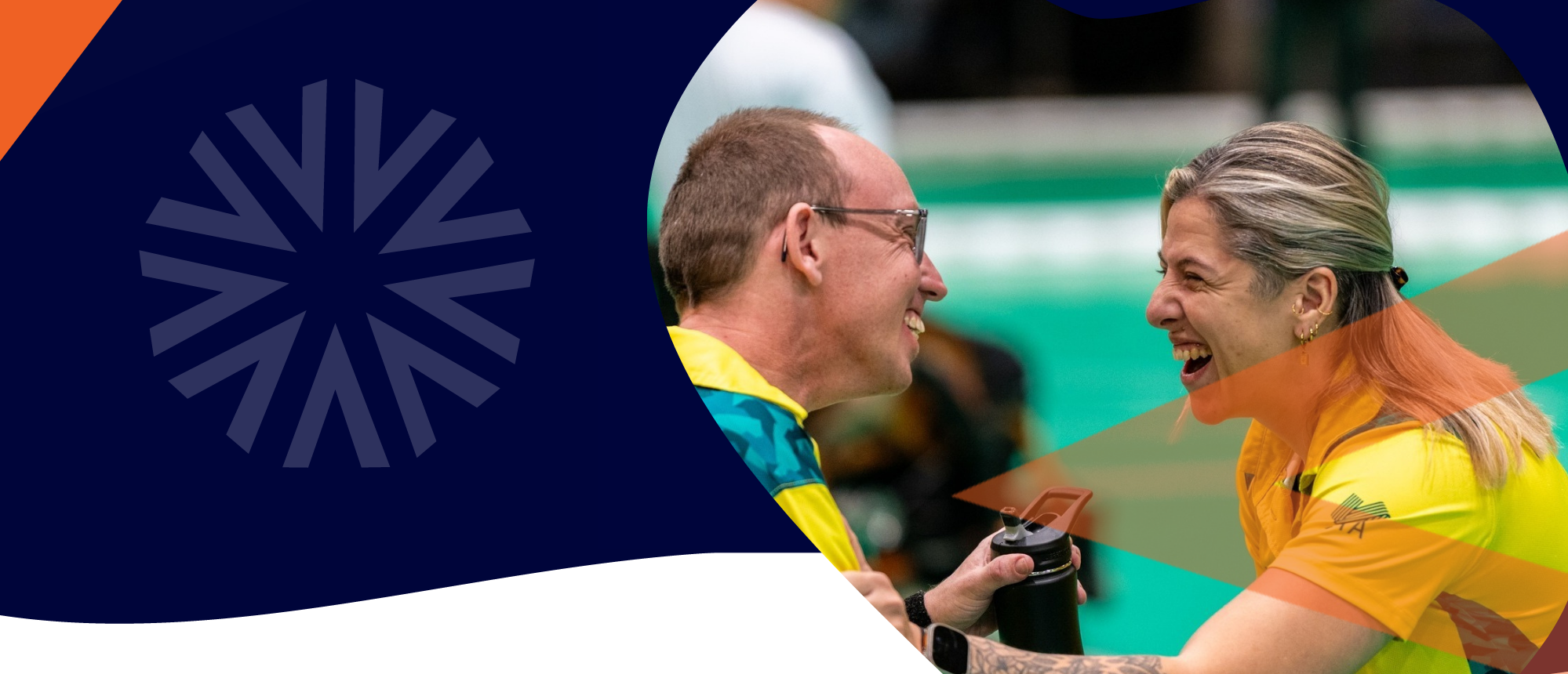 Two smiling athletes in yellow and orange ASAPD uniforms celebrate on a green court, with logo overlay.